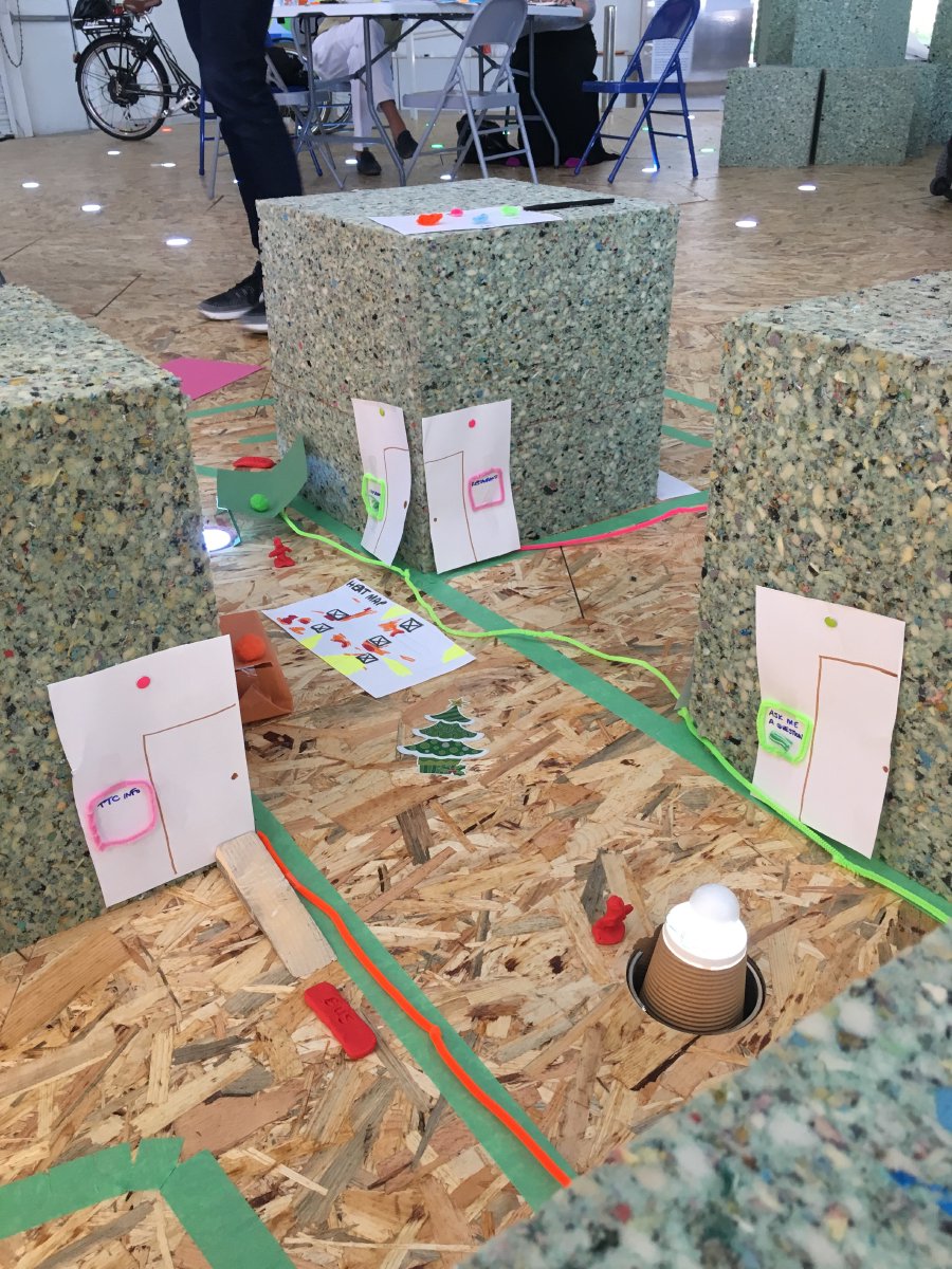 The prototype of a pedestrian focused neighborhood built by group Side Thoughts using foam blocks and construction paper