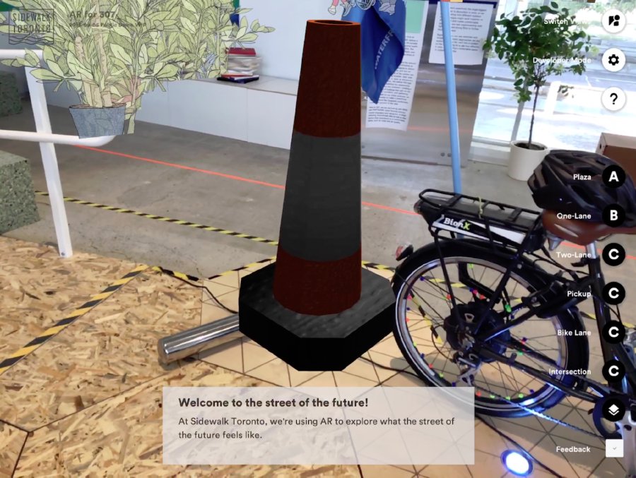 Screenshot of park features image including trees and a plastic cone projected on the real view of the Sidewalk Lab space